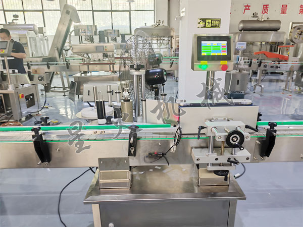 全自动搓滚式圆瓶贴标机实拍图